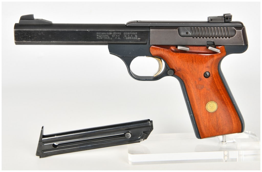 Browning Buck Mark Semi-Automatic Pistol .22 Long Rifle with 5.5 Inch Barrel: This Browning Buck Mark is a semi-automatic pistol chambered in .22 Long Rifle designed for target shooting and recreational use. The firearm features a 5.5 inch blued steel slab-side barrel paired wi