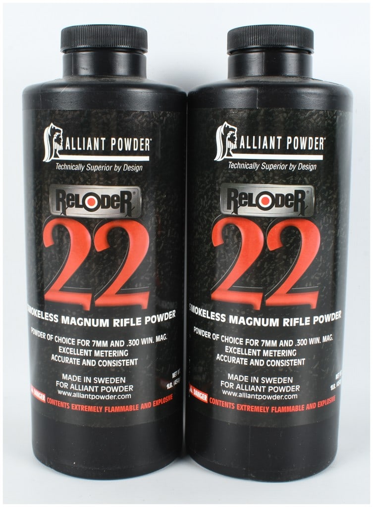 A Pair of Alliant Powder Reloder 22 Smokeless Magnum Rifle Powder Canisters, 2 lbs Total: Two 1-lb. black plastic canisters of Alliant Powder Reloder 22 smokeless magnum rifle powder. The front labels feature the Alliant Powder logo with a stylized helmeted figure and identify the contents
