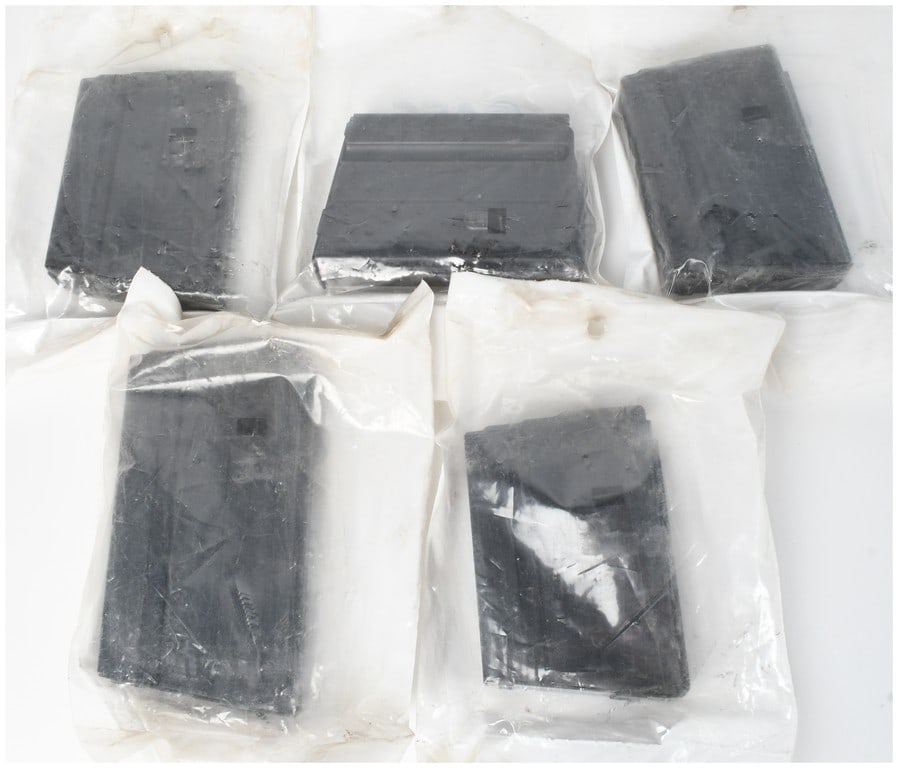 A Lot of 5 Ammunition Storage Components 6.8 SPC Stainless Steel Magazines: This lot consists of five rifle magazines manufactured by Ammunition Storage Components (ASC), specifically designed for use with 6.8 SPC cartridges. The collection includes four 10-round magazines an