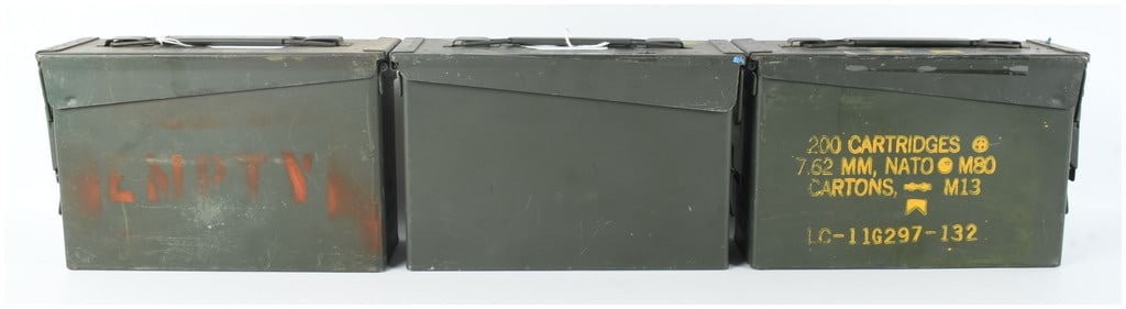 Three United States M19A1 Steel Ammunition Cans: This lot comprises three United States military surplus ammunition containers, designated as the M19A1 model, intended for 7.62mm NATO or .30 caliber ammunition storage. Each box is constructed from c