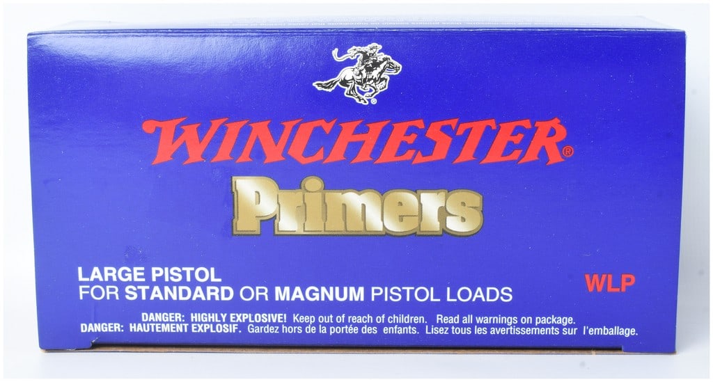 A Box of 1,000 Winchester Large Pistol Primers No. WLP: One box of 1,000 Winchester Large Pistol primers, designated as No. WLP, manufactured for use in both standard and magnum pistol loads. The primers are brass-toned and organized within a gray plastic 