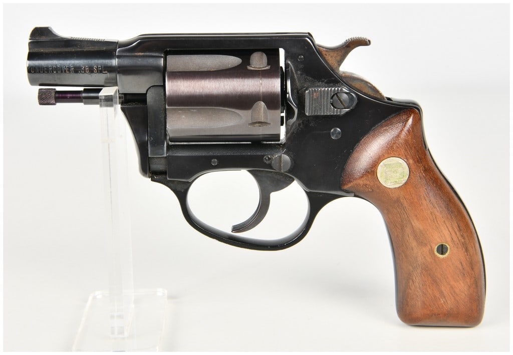 Charter Arms Undercover Double Action Revolver .38 Special with 2 Inch Barrel: This Charter Arms Undercover is a compact five-shot double-action revolver chambered in .38 Special designed for concealed carry. The firearm features a two-inch barrel with an integrated fixed front