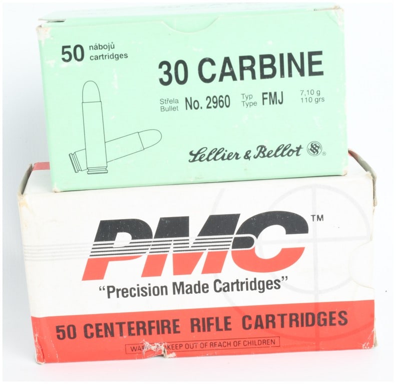 A Lot of 100 Rounds of Sellier and Bellot and PMC .30 Carbine 110 Grain FMJ Ammunition: This lot consists of 100 rounds of .30 Carbine ammunition divided into two boxes of 50 rounds each. The first box is a light green Sellier and Bellot container identifying the contents as 50 n?boj?