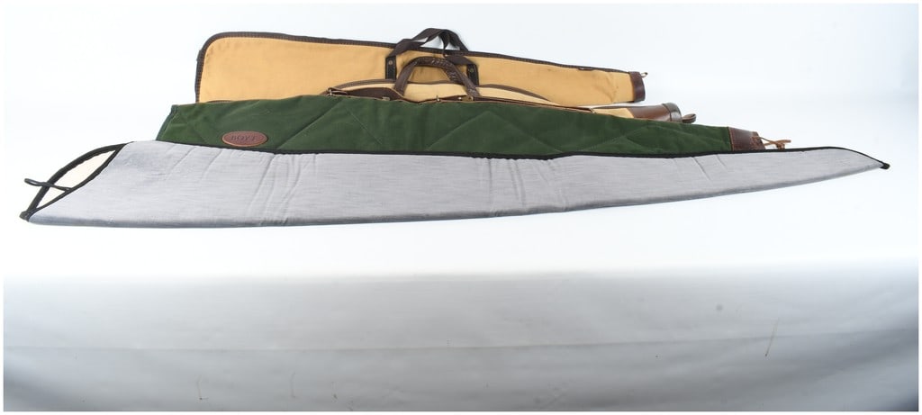 A Set of Four Gun Cases and Protective Slips Including Boyt (1 of 7)