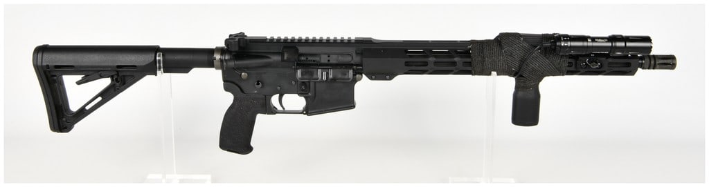 DPMS Panther Arms A-15 Semi-Automatic Rifle Multi-Caliber: This DPMS Panther Arms Model A-15 is a semi-automatic rifle chambered in a multi-caliber configuration. It features a matte black finish on the aluminum receivers and is equipped with a steel barrel f
