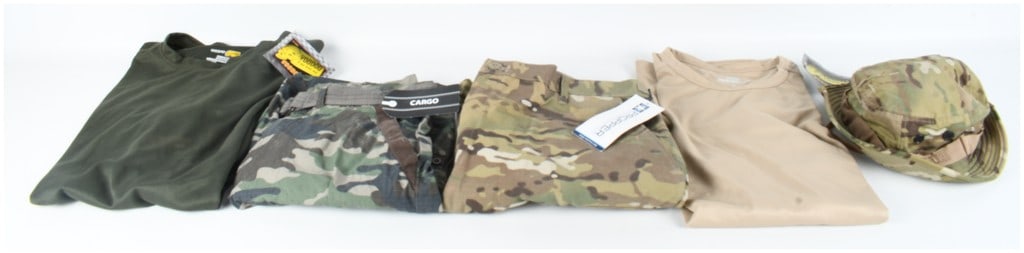 Five Piece Collection of Tactical Apparel Including Voodoo Tactical Propper and 5.11 Tactical: This collection of five pieces of tactical apparel features items from manufacturers Voodoo Tactical, Propper, 5.11 Tactical, and Extreme Coalition. The group includes two Voodoo Tactical performance 