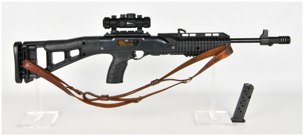 Hi-Point Model 995 Semi-Automatic Carbine 9mm with 16.5 Inch Barrel: This Hi-Point Model 995 is a semi-automatic carbine chambered in 9mm Luger, designed as a durable and functional pistol-caliber long gun. The firearm features a 16.5 inch barrel equipped with a