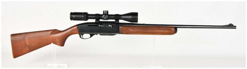 Remington Woodmaster Model 740 Semi-Automatic Rifle .30-06 Springfield: This lot features a Remington Woodmaster Model 740 semi-automatic rifle chambered in .30-06 Springfield. The firearm is constructed with a blued steel barrel and receiver, complemented by a walnut