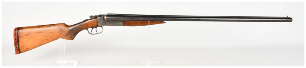 Ranger Side-by-Side Shotgun 12 Gauge with 31 Inch Barrels: This is a break-action, hammerless side-by-side shotgun chambered in 12 gauge, featuring 31-inch barrels intended for sporting use. The firearm is configured with dual triggers, a tang-mounted safety,