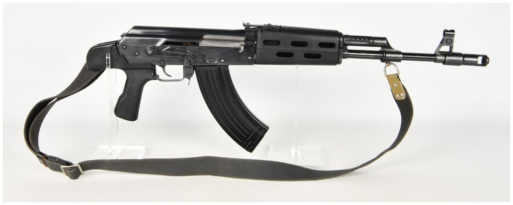 Norinco MAK-90 Sporter Semi-Automatic Rifle 7.62x39mm: This Norinco MAK-90 Sporter semi-automatic rifle is chambered in 7.62x39mm and features a blued finish with black synthetic furniture. The rifle is equipped with a ventilated handguard and a pistol gr