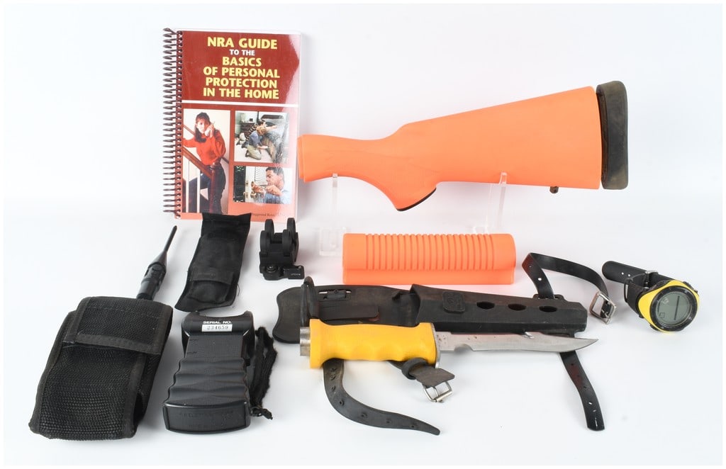 An Assortment of Personal Protection and Field Equipment including Hogue Less Lethal Shotgun: This lot features a group of personal protection, training, and outdoor equipment. The primary component is a Hogue Less Lethal orange OverMolded shotgun furniture set, consisting of a synthetic butts