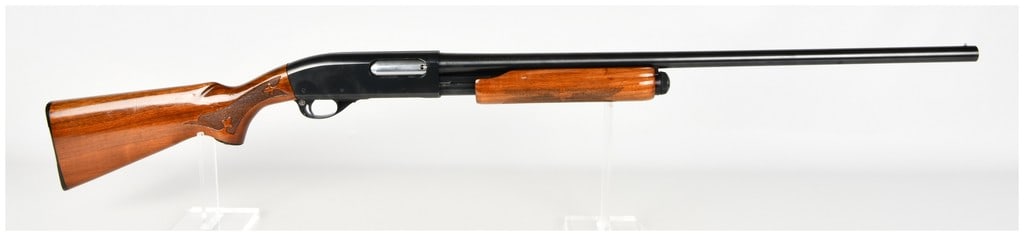 Remington Model 870 Wingmaster Pump Action Shotgun 12 Gauge with 28 Inch Barrel: This is a Remington Model 870 Wingmaster pump-action shotgun chambered in 12 gauge for 2 3/4-inch or shorter shells. The firearm is equipped with a 28-inch plain barrel featuring a single silver front