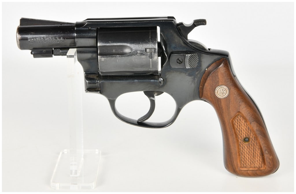 Rossi Model 33 Double Action Revolver .38 Special with 2 Inch Barrel: This Rossi Model 33 is a five-shot, double-action/single-action revolver chambered for the .38 Special cartridge, configured as a compact snub-nose defensive firearm. It features a 2-inch barrel