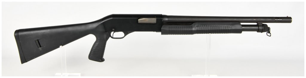 Stevens Model 320 Pump-Action Shotgun 12 Gauge with 18.5 Inch Barrel: This Stevens Model 320 is a pump-action shotgun chambered for 12 gauge shells, compatible with both 2 3/4-inch and 3-inch cartridges. It is configured as a utility firearm featuring an 18.5-inch barre