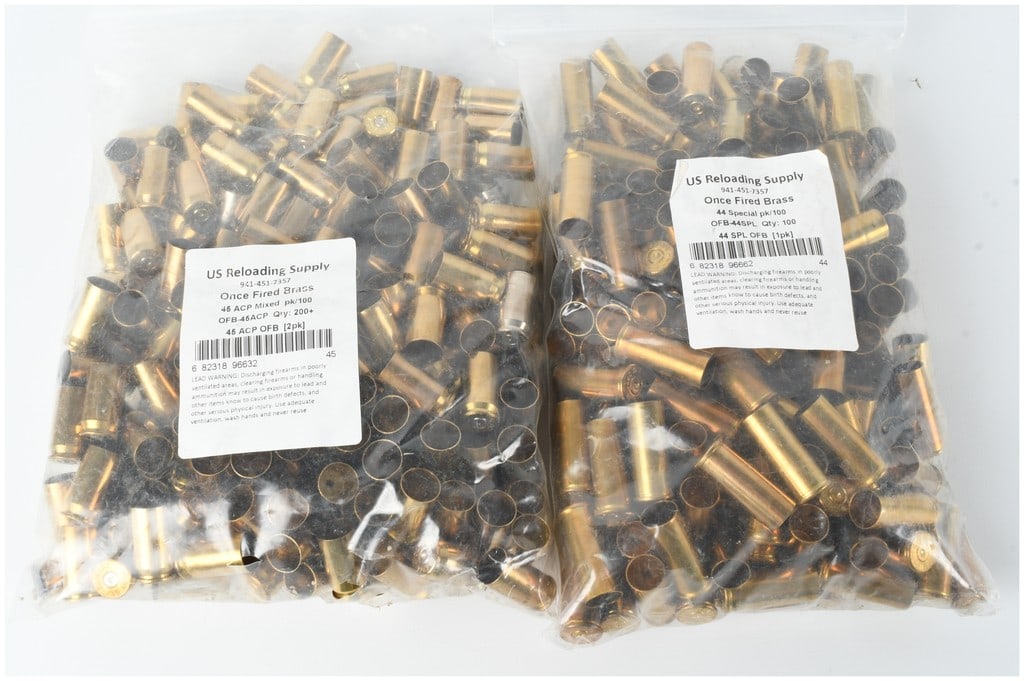 A Collection of 300 US Reloading Supply .45 ACP and .44 Special Once Fired Brass Casings: A collection of 300 once-fired brass (OFB) cartridge casings from US Reloading Supply, intended for ammunition reloading. The lot consists of two clear, labeled bags. One bag contains 200 mixed .45 AC
