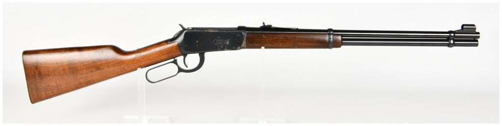 Winchester Model 94 Lever Action Rifle .30-30 Winchester with 20 Inch Barrel: This Winchester Model 94 lever-action rifle is chambered in the classic .30-30 Winchester cartridge and features a 20-inch round barrel with a full-length tubular magazine. The firearm is constructed 