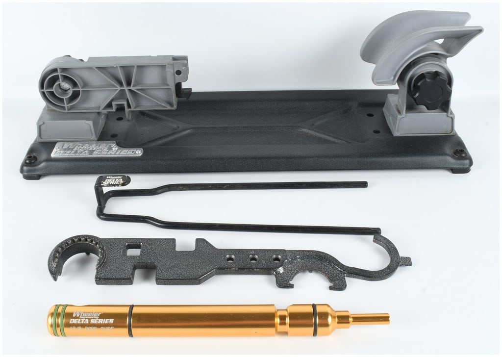 A Collection of 4 Wheeler Engineering Delta Series AR-15 Maintenance and Gunsmithing Tools: This collection of four Wheeler Engineering Delta Series gunsmithing tools is designed for the assembly and maintenance of the AR-15 rifle platform. The set includes a maintenance gun vise, an armorer