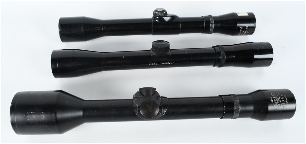A Collection of Three Rifle Scopes Including Pecar Berlin, Bushnell Sportview, and Wesco-64: This lot consists of a collection of three vintage rifle scopes of varying manufacture and magnification. The most substantial optic is a German-made Pecar Berlin unit with a wide objective lens bell 