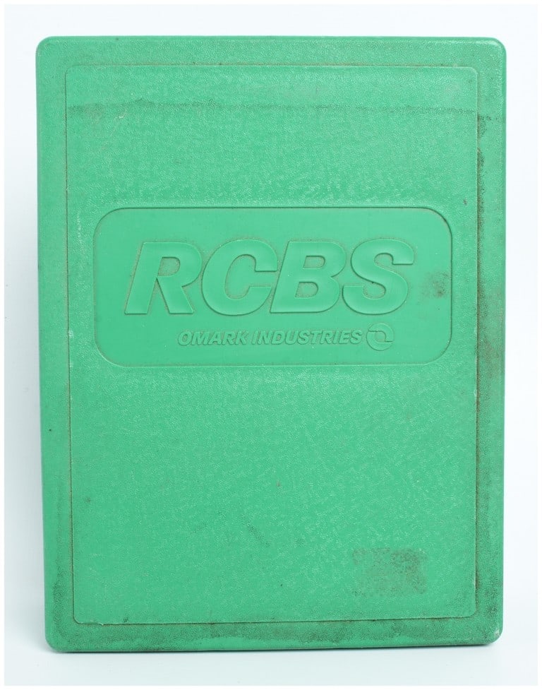 RCBS Omark Industries 25-06 Remington Full Length Die Set: An RCBS full length die set for .25-06 Remington, produced by Omark Industries. This Group A die set, part number 12001, includes two steel reloading dies housed in a signature green textured plastic 