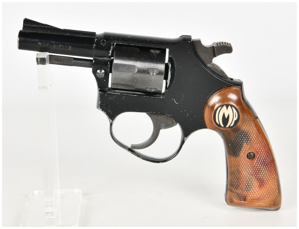 Imperial Metal Products Model 9 Double Action Revolver .22 LR with 2.5 Inch Barrel: A single Imperial Metal Products Model 9 double-action revolver chambered in .22 Long Rifle, configured as a compact, solid-frame handgun for personal defense or utility use. This firearm features a b