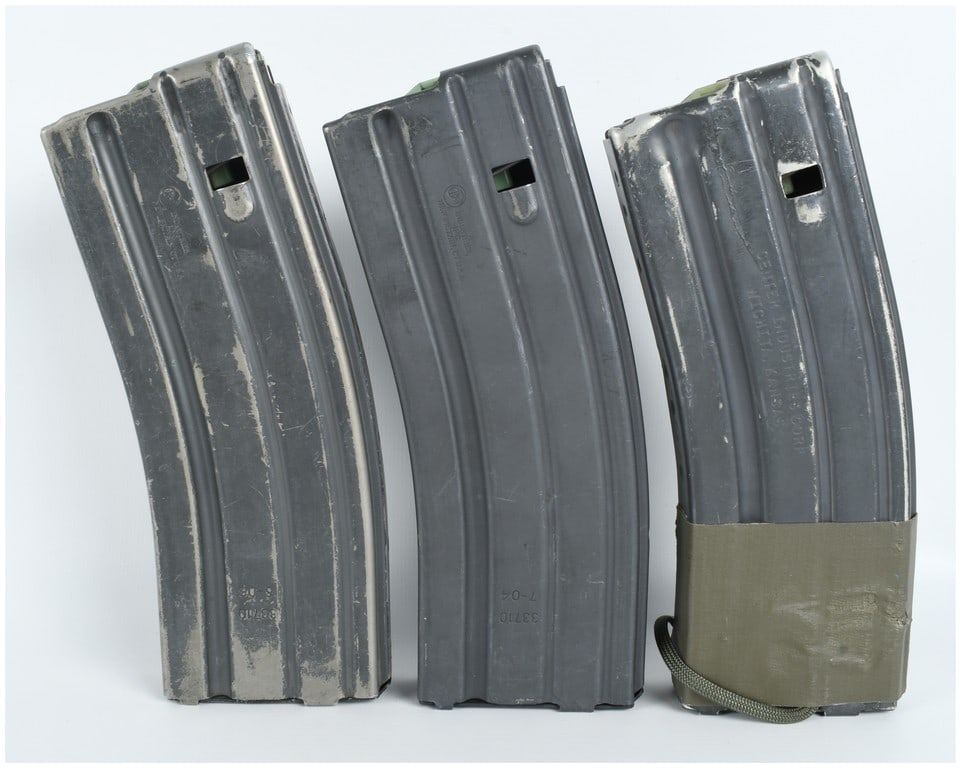 Three USGI AR-15 M16 30 Round Aluminum Magazines 5.56x45mm NATO: This lot comprises three 30-round aluminum magazines designed for AR-15 and M16 pattern rifles chambered in 5.56x45mm NATO. Two of the magazines were manufactured by Ray Industries, Inc. of New Britai