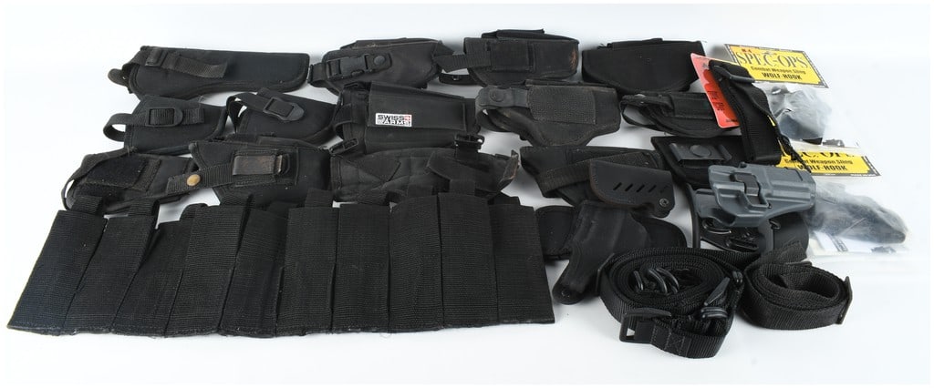 An Assortment of Commercial Black Nylon Tactical Gear and Holsters: A collection of contemporary commercial tactical equipment constructed primarily from heavy-duty black nylon. The lot includes an assortment of universal-style pistol holsters, magazine pouches, and w