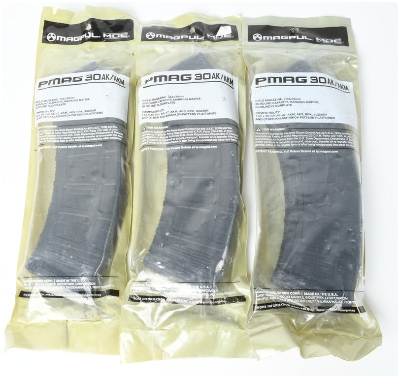 Three Magpul PMAG 30 AK/AKM MOE Rifle Magazines 7.62x39mm: This lot features three factory-sealed Magpul PMAG 30 AK/AKM MOE magazines designed for 7.62x39mm rifle platforms. These 30-round capacity magazines are constructed from black polymer and are intended
