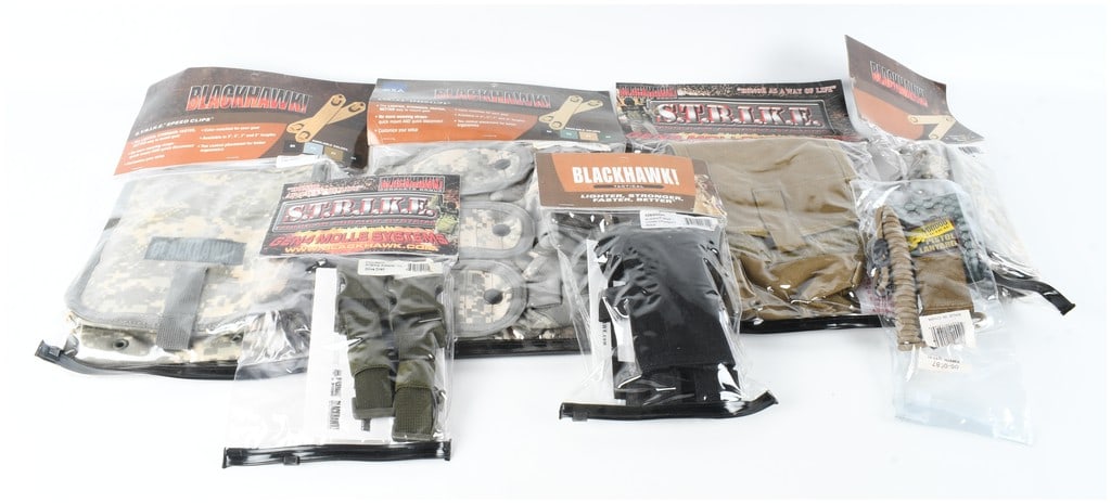 Lot of Seven Modern Tactical Gear Items Including Blackhawk! and Voodoo Tactical Components: A collection of seven modern tactical equipment items primarily manufactured by Blackhawk! and Voodoo Tactical. These items date from the Global War on Terror (GWOT) era and feature various military c