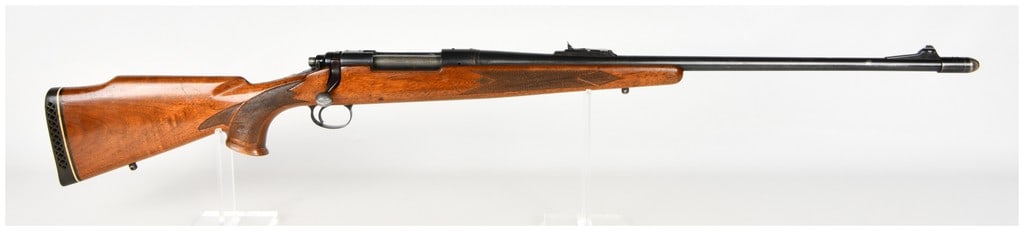 Remington Model 700 Bolt Action Rifle 7mm Remington Magnum with 24 Inch Barrel: One Remington Model 700 bolt action rifle chambered in the powerful 7mm Remington Magnum cartridge. This rifle is configured with a blued finish on the receiver and the tapered barrel, paired with a c