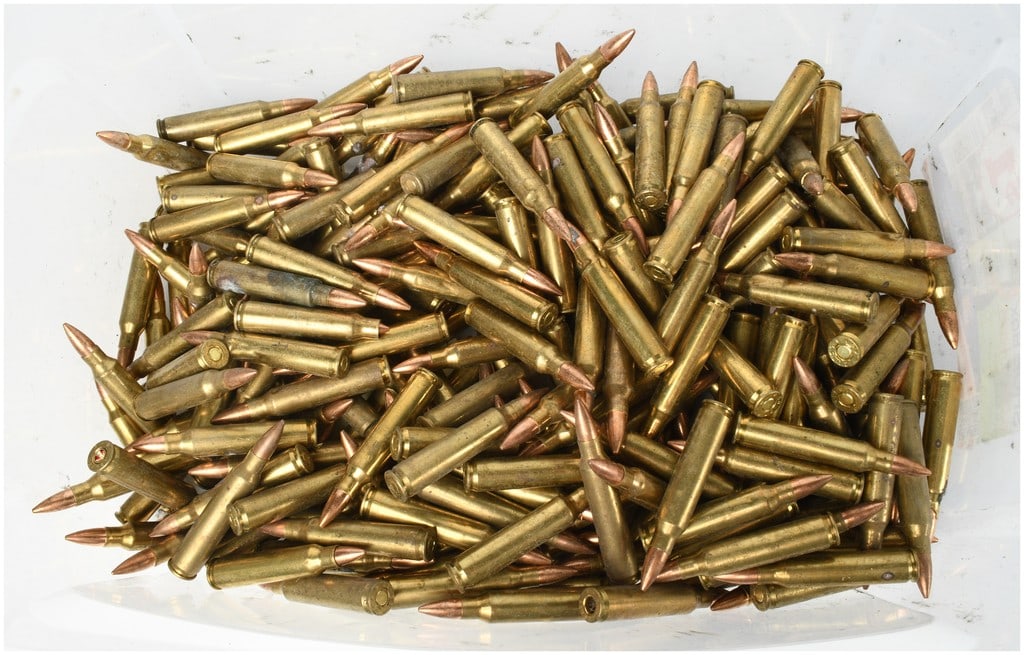 A Lot of 250 Lake City 5.56x45mm NATO Centerfire Rifle Ammunition: This lot consists of a bulk quantity of 250 rounds of 5.56x45mm NATO centerfire rifle ammunition produced by the Lake City Army Ammunition Plant. The cartridges feature brass casings and full metal ja