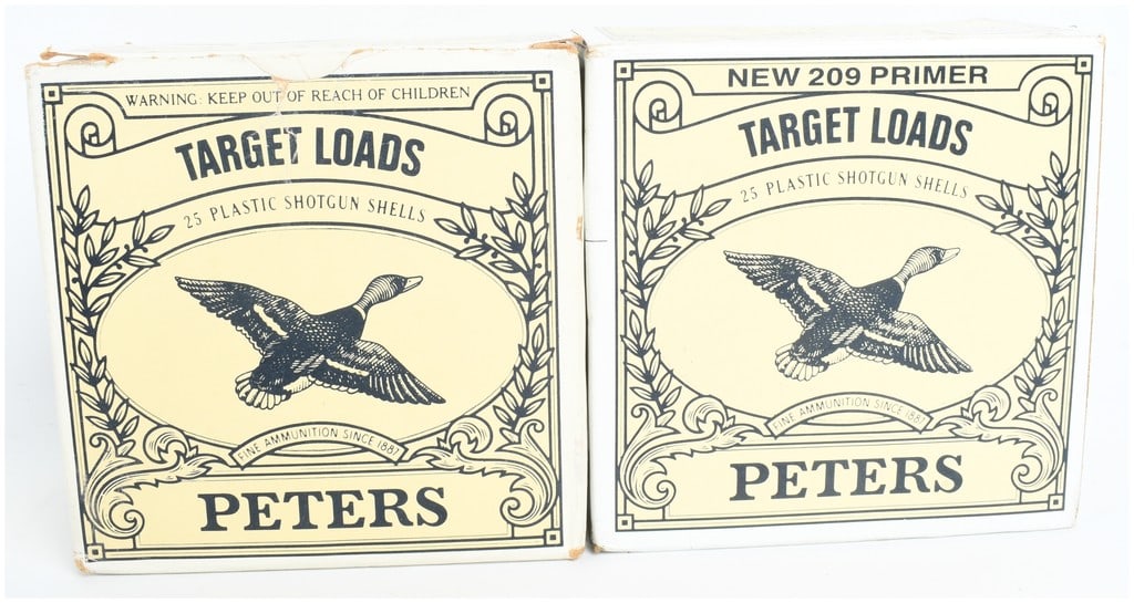 Peters Heavy Target Load 12 Gauge Shotgun Ammunition: This lot consists of 50 rounds of Peters brand 12-gauge shotgun ammunition, contained within two original boxes of 25 rounds each. These heavy target loads feature blue plastic hulls with low-profile 