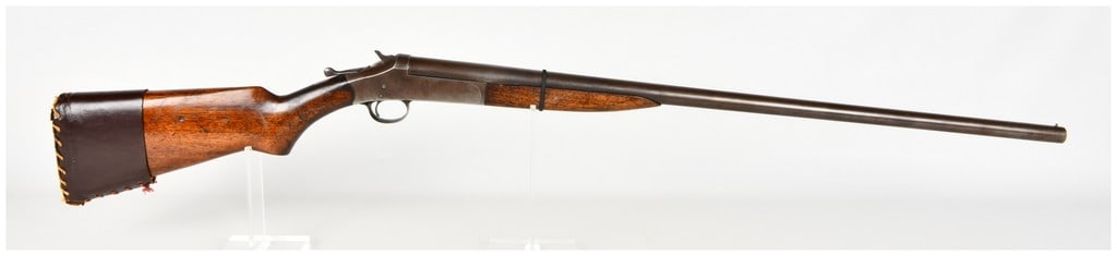 Harrington & Richardson Model 1900 Break Action Shotgun 16 Gauge with 30 Inch Barrel: This is a single-shot, break-action shotgun chambered in 16 gauge, featuring a 30-inch barrel with a fixed choke. The firearm is equipped with an external hammer, a top-lever release mechanism, and a 