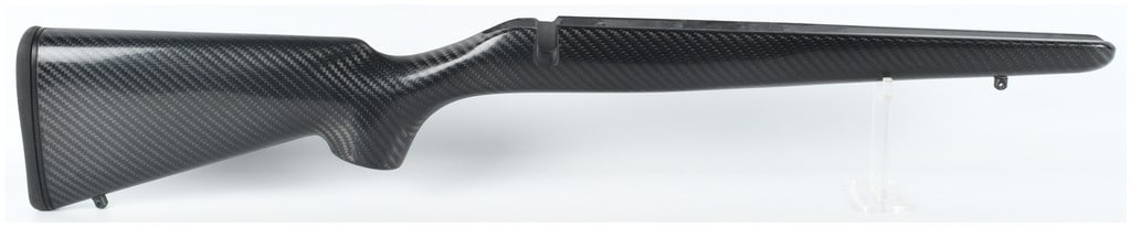 A Carbon Fiber Sporter Style Rifle Stock Attributed to Stocky's for Howa Mini Action: This is a lightweight carbon fiber composite rifle stock, attributed to Stocky's and identified as the NextGen Ultra Carbon Hunter model, designed for a Howa Mini bolt-action. The stock features a pro