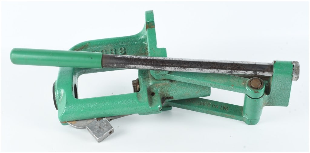 RCBS RC-I Single-Stage Ammunition Reloading Press: This RCBS RC-I single-stage ammunition reloading press is constructed with a heavy green painted cast-metal O-frame designed for bench-mounted operation. The press features a central steel ram operate
