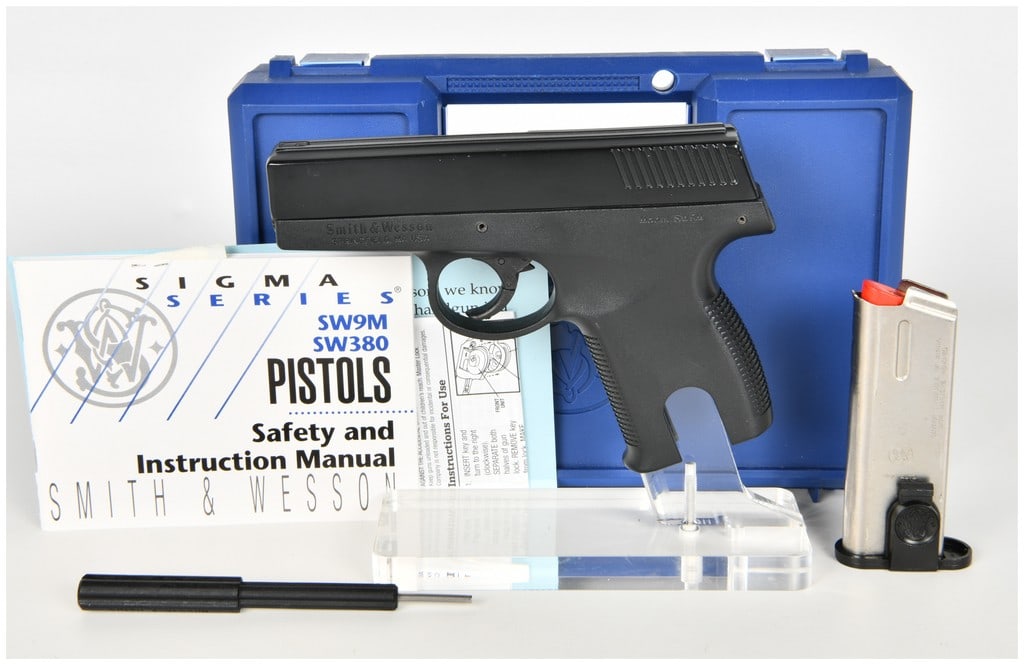 Smith & Wesson Model SW9M Semi-Automatic Pistol 9mm with 3.25 Inch Barrel: This Smith & Wesson Model SW9M is a subcompact semi-automatic pistol chambered in 9mm. The firearm features a black-finished slide mounted on a black polymer frame with an integrated textured wrap-aro