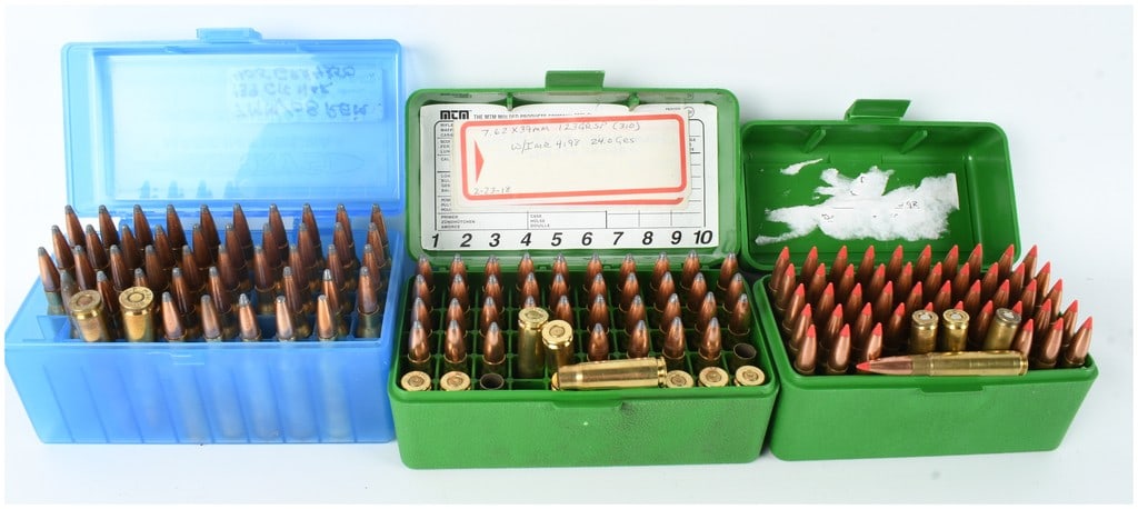 A Collection of 134 Assorted Rifle Ammunition Rounds and 15 Empty Casings in 7mm-08 Remington, 7mm: This lot comprises three plastic storage cases containing a collection of 134 live centerfire rifle ammunition rounds and 15 empty brass casings. Included are 45 rounds of 7mm-08 Remington ammunition 