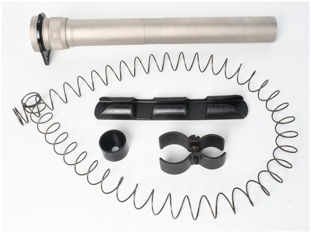 A Five Piece Extended Magazine Tube Kit for 12 Gauge Shotguns: This is a five piece extended magazine tube kit designed for use with 12 gauge shotguns to increase overall ammunition capacity. The kit features an extended magazine tube constructed of metal with a 
