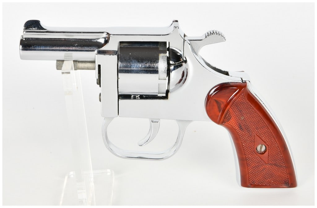 Clerke Technicorp 1st Double Action Revolver .32 S&W with 2 Inch Barrel: This is a Clerke Technicorp 1st model double action revolver chambered for .32 S&W. It is configured with a 2 inch barrel and a six shot swing out cylinder. The metal surfaces feature a bright chrome 