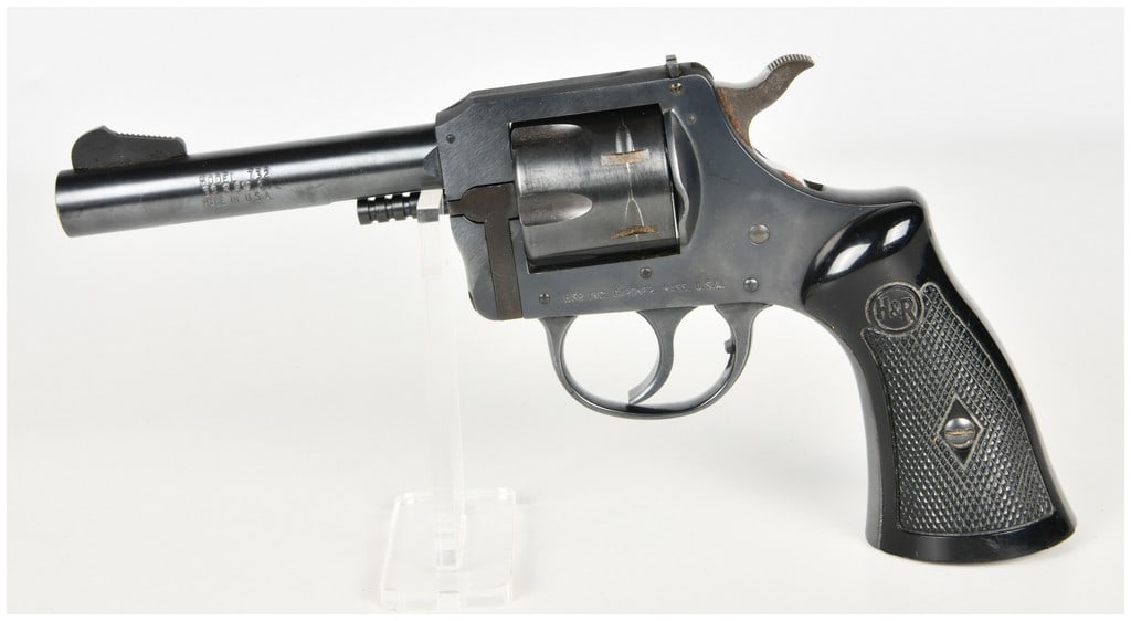 A Pair of Handguns: Harrington & Richardson Model 732 Double Action Revolver .32 S&W Long and: A pair of handguns comprising a revolver and a semi-automatic pistol. The first item is a Harrington & Richardson Model 732 double-action revolver chambered for .32 S&W Long, featuring a 4-inch barrel
