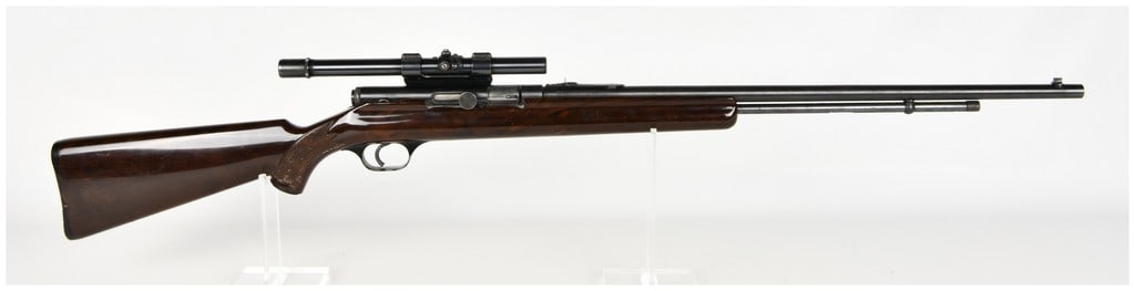 J.C. Higgins Model 101.16 Semi-Automatic Rifle .22 LR with 24 Inch Barrel: This is a semi-automatic rifle manufactured for Sears, Roebuck & Company under the J.C. Higgins brand, designated as the Model 101.16. The firearm features a 24-inch blued steel barrel equipped with a
