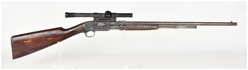 Remington Model 12 Pump Action Rifle .22 S, L, LR with 24 Inch Barrel: This Remington Model 12 is a pump-action rifle chambered for .22 Short, Long, or Long Rifle cartridges, featuring a 24-inch round barrel with an under-barrel tubular magazine. The metal surfaces exhib