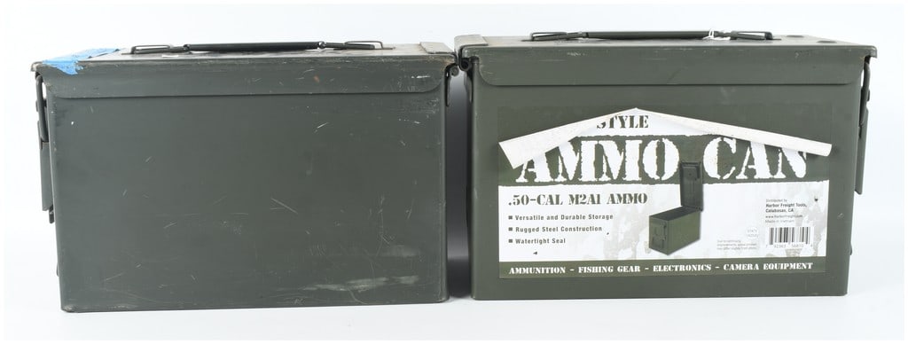 Two .50 Caliber Style M2A1 Steel Ammunition Cans: This lot consists of two steel ammunition cans in the .50 caliber M2A1 style, both finished in olive drab. One can is a modern commercial reproduction distributed by Harbor Freight Tools of Calabasas,