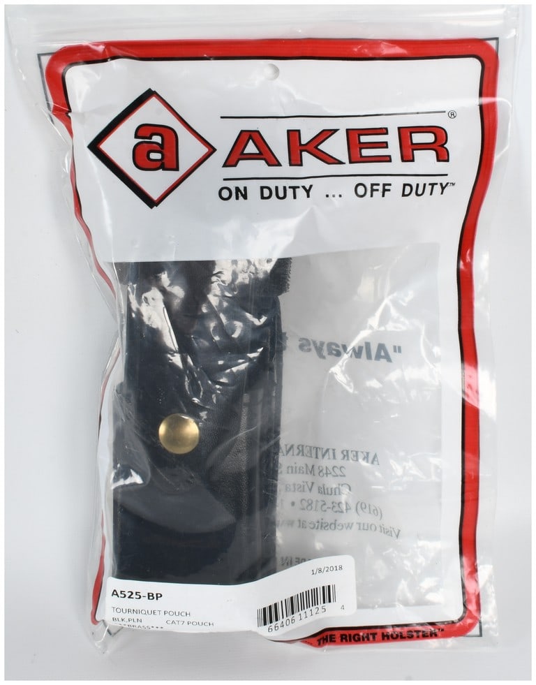 Aker International Model A525-BP Tourniquet Pouch: One Aker International, Inc. model A525-BP tourniquet pouch, designed specifically for use with a CAT7 tourniquet. The pouch is constructed of black leather with a plain finish and features a gold-ton
