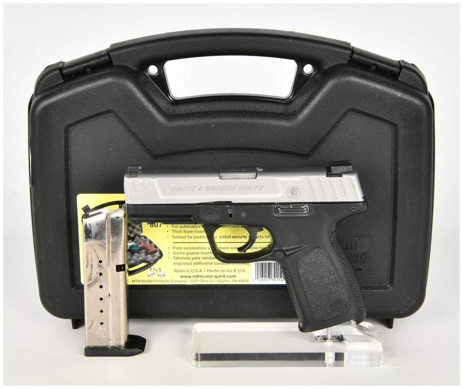 Smith & Wesson SD9 VE Semi-Automatic Pistol 9mm with 4 Inch Barrel: This Smith & Wesson SD9 VE is a semi-automatic striker-fired pistol chambered in 9mm, featuring a 4 inch barrel and a distinct two-tone configuration consisting of a stainless steel slide paired with 