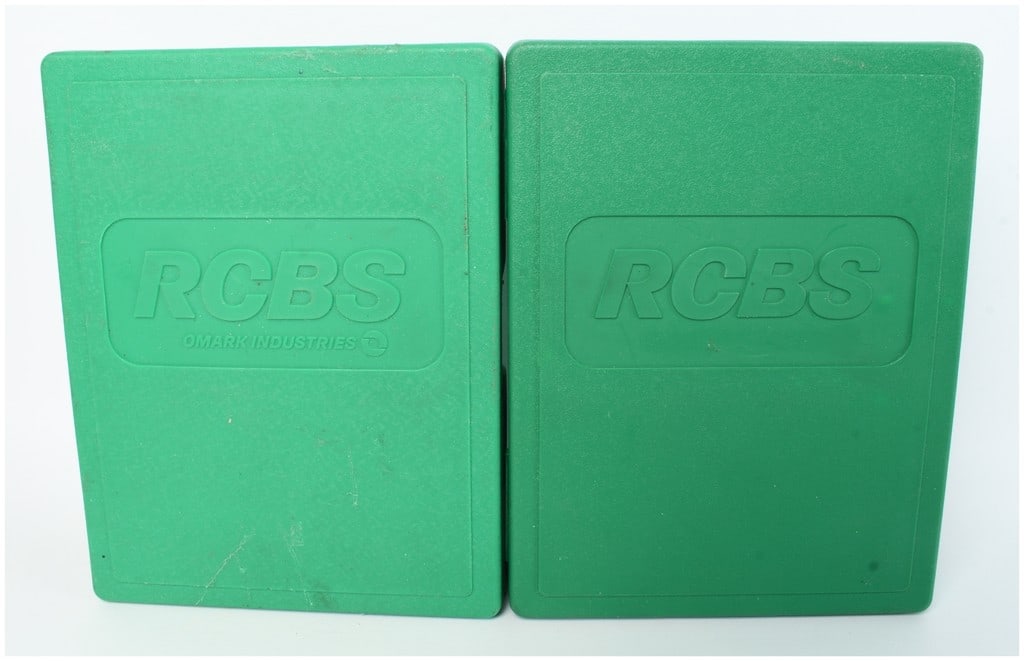 Two RCBS Reloading Die Sets for .204 Ruger and .22-250 Calibers: A group of 2 die sets for ammunition reloading manufactured by RCBS, a division of Omark Industries. The collection includes one .204 Ruger neck sizer set (P/N 10330, Group A) intended for use with a 
