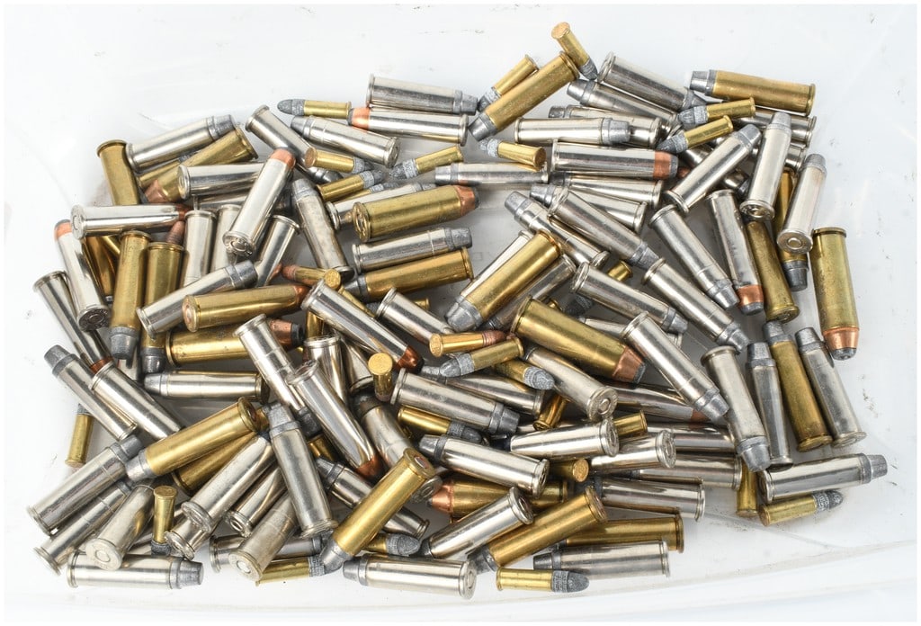 A Lot of 162 Assorted Centerfire and Rimfire Handgun Cartridges: This lot consists of a collection of 162 loose handgun cartridges featuring a variety of calibers and projectile types. The assortment includes centerfire ammunition chambered in .357 Magnum, .38 Spec