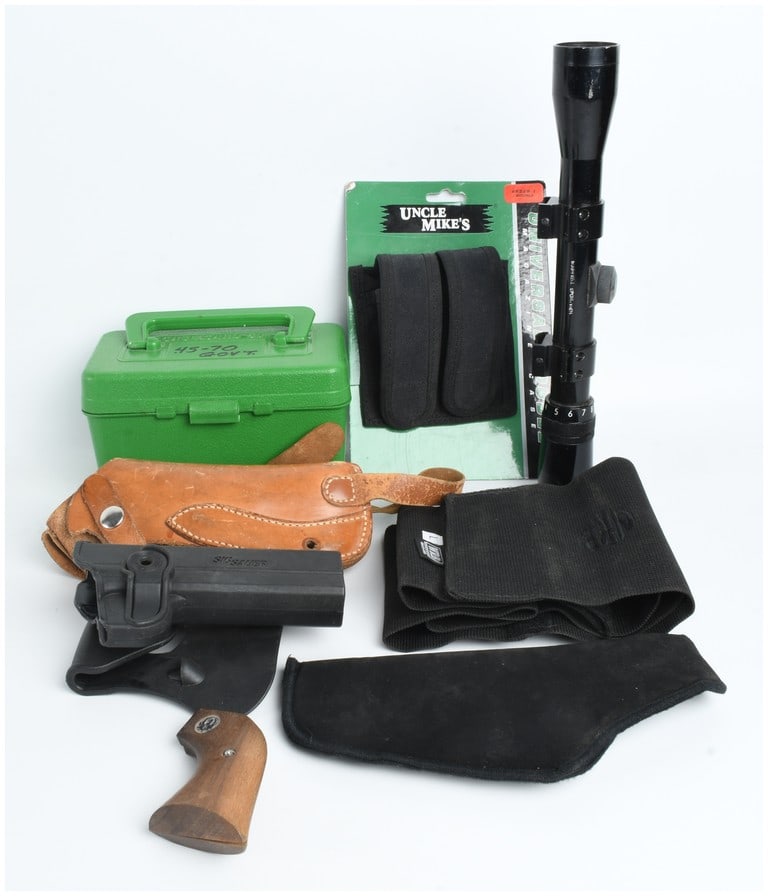 An Assortment of Eight Firearm Accessories including a Bushnell Rifle Scope and Ruger Grips (1 of 14)