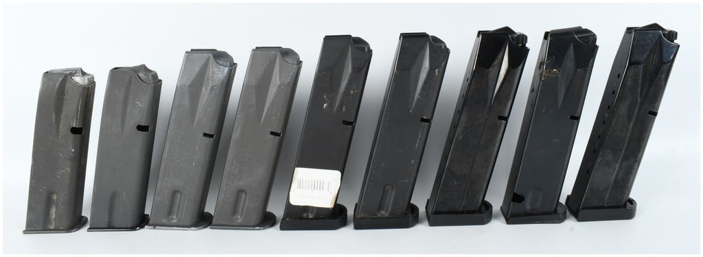 A Collection of 9 Beretta 92-Series and M9 Semi-Automatic Pistol Magazines 9mm Luger: This lot consists of nine double-stack semi-automatic pistol magazines primarily compatible with the Beretta 92-series and M9 9mm handguns. The collection features several variations in finish and cap