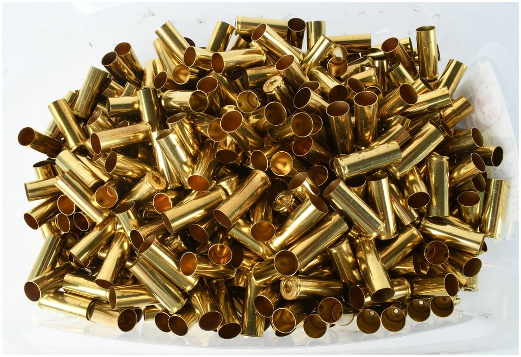 500 Starline .45 Colt Once Fired Brass Casings: A collection of 500 once fired brass cartridge cases for .45 Colt. The casings are identifiable by the Starline Brass headstamp, which features the caliber 45 COLT and the manufacturer's mark consisti