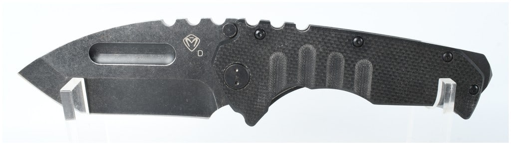 Medford Knife and Tool Praetorian Carbon Fiber Rugged Combat Folder: Medford Knife and Tool Praetorian single-blade folding pocket knife designed in a rugged combat folder style. The blade is constructed of D2 tool steel with a black physical vapor deposition and stone